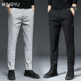 Mingyu varumärke höst män casual byxor män byxa smal passform elastisk midja svart grön grå ljus jogging byxor man 28-38 211201