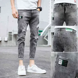 Summer thin 2020 Fashion Denim Skinny jeans men's Ripped hole Korean men's small feet stretch casual brand teenager pencil pants G0104