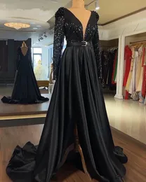 Vacker svart en linje kväll klänningar djup v nacke sequined golvlängd satin långärmad hög sida split formell klänning robes de bal Vestidos