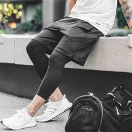 Spodnie sportowe moro męskie dwupokładowe 2 w 1 oddychające spodnie treningowe do biegania Gym Fitness spodenki do joggingu szybkoschnące męskie spodnie 210716
