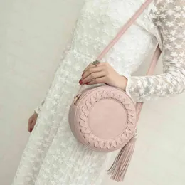 HBP Non- style version women's single shoulder solid color woven tassel small round bag fashion make-u