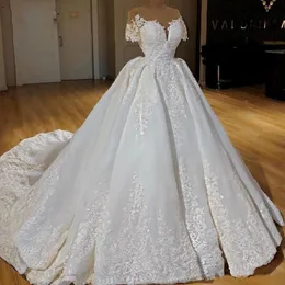 Abiti da sposa dal design di lusso Abiti da sposa trasparenti con applicazioni in pizzo con collo gioiello Increspato Sweep Train Princess Vestido de noiva