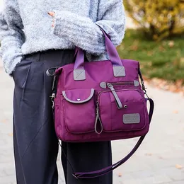 女性のマルチポケットショルダーバッグ新しいファッションポータブル屋外旅行ジッパー多機能大容量ハンドバッグ2021