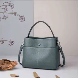 NXY Evening Bags 2022 new bucket bag leather women's portable fashion Leather One Shoulder Messenger 220211