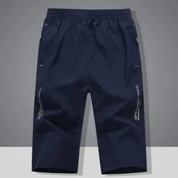 Pantalones cortos para hombres Hombres de verano Llegada Hombres transpirable Bermudas Longitud de la rodilla Marca de elasticidad Secar rápido Tallas grandes -40