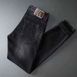 Jeans outono homens magro fit pouca pés international coreano coreano bordado calças na moda