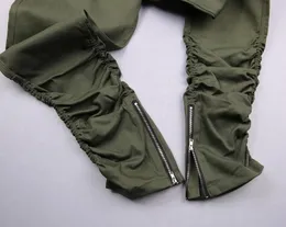 Tailored men's jeans in pine green Denim and Cashmere | Kiton