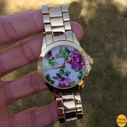 high style on a pretty bracelet watch and finished with a vintage floral print center links. Feel beautiful e