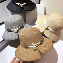 Simple Style Women Straw Hat Summer Outdoor Beach Sun Cap Vintage Personality Horn Buttons Caps Asymmetry Wide Brim Hats