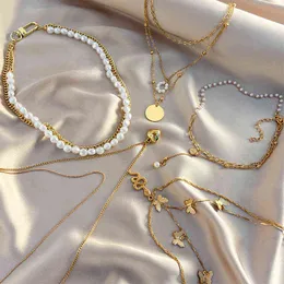 17km trendig multilayer hjärta orm hängande halsband för kvinnor guld fjäril kedja halsband pärla choker gåvor smycken g1206