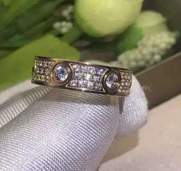 Full Diamant Titan Stål Silver Kärlek Ring Män Kvinnor Rose Guld Ringar Älskare Par Designer Ringar Smycken present