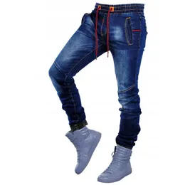 Mode casual man jeans solid dragsko denim byxor elastiska bälte klassiska harem byxor jogger vår höst penna byxor