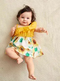Baby solrosutskrift asymmetrisk nacke ruffle trim klänning hon