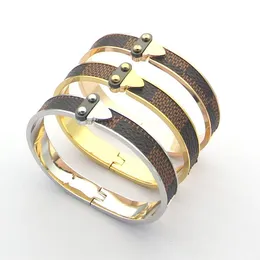 Kedja utrikeshandel armband v slips läder titan stål 18k guld plaid mönster