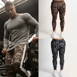 Mode män ny camo print joggare penna byxor manlig sida randig elastisk midja dragsko kamouflage byxa casual byxor