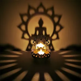 Ljusstake Buddha smör oljelampa sittande buddha lotus funktion metall ihålig snidad ljus och skugga konst ljusstake 210727