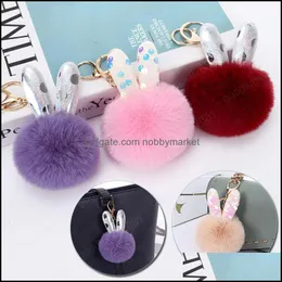 Kluczowe pierścienie Biżuteria Faux Fur Keychain Pompon Miękkie Królik Uszy Torby Wiszące Łańcuch Wisiorek Kulki Pierścionek Torba Prezent Samochód Llaveros Drop Dostawa 2021 Xklw