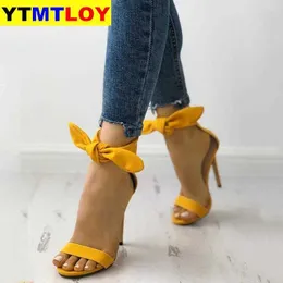 Новейший бренд дизайнер желтые замшевые сандалии на высоком каблуке лодыжки Big Sunknot гладиатор сандалийские туфли один ремешок тонкий каблук насосы х0526