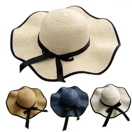 Women Bowknot Straw Weave Wavy Wide Brim Sunscreen Outdoor Beach Sunhat Cap Hat Anti Uv cap girls Sun Hat Panama1