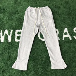 Pantaloni in cotone con lettere ricamate 22SS Uomo Donna Hip Hop Quattro stagioni Colore grigio