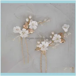 Juvelygold bladstift brudklipp porslin blomma bröllop huvudstycke handgjorda kvinnor hår aessory pärlor smycken droppleverans 2021 gmnih