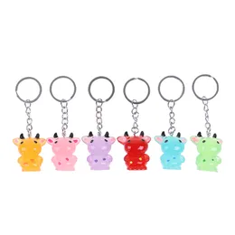 10pieces / Lot Cow Keychain Alloy Key Ring Cartoon Animal Bag Pendant År av Ox New Year Presentkedjor
