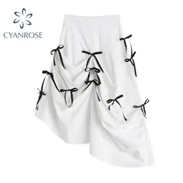 不規則なスイングの弓の折りたたみスカートの女性森のガイルハイウエストソリッドホワイトスカート夏の新しい韓国風ファッションシックなミニJUPE 210417