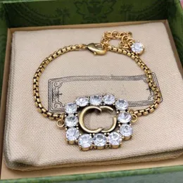 Золотой подбородок для браслета женские женские ювелирные изделия роскошные алмазные буквы дизайнеры браслеты мужские мужские браслеты червок D2110253HL