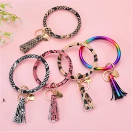 Chave de pulseira de círculo redondo chaveiro em forma de pingente chaveiro pulseira pu chaveiro de couro para mulheres borla carro keychain pulseira rrb14017