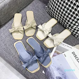 Sandals and slippers female 2021 bow spring net red ins tide all-match flat casual beach shoes