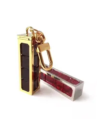 주사위 분리 가능한 열쇠 고리 스트랩 편지 고품질 금속 유니섹스 디자이너 키 반지 남자 여자 펜던트 패턴 자동차 키 체인 보석 액세서리 상자 IVY001