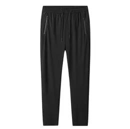 2021 Męskie Męskie Dorywczo Elastyczne Spodnie Waist Oddychające Soft Stretch ICE Silk Spodnie Solidne Joggers L-8XL Mężczyźni Odzież NK007
