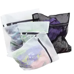 Bolsas de lavanderia 4pcs/conjunto de roupas Máquina de lavar sutiã Aid de lingerie malha de lavagem de lavagem de armazenamento bolsa cesto femme