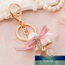 ピンクエナメルラインストーン傘キーチェーン女性バッグリボン小飾り真珠の花ペンダントカーアクセサリーチャームキーリング工場価格専門のデザイン品質