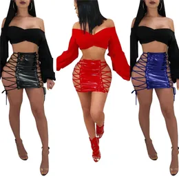 Club Sexy Hollow Out Lace-up Design Lady Mini Skirt Cool Fashion PU Läder Charmig Kvinnors Kort 210708