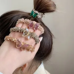 女性の女の子のポニーテールホルダーバタフライクリスタルヘッドバンドヘアロープアクセサリーのための卸売ファッションヘアリング