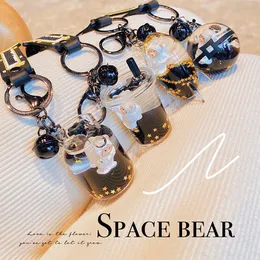 Black gold dream astronaut cute Bear into oil rocket cup key chain floating doll schoolbag small pendant