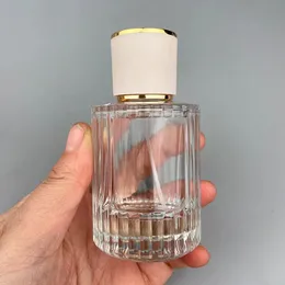 トラベラーのための噴霧器が付いている30mlの50mlの携帯用の透明なガラスの香水のスプレーの瓶の空の化粧品容器