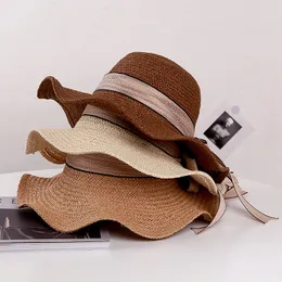 古典的なビーチの太陽の麦わら帽子夏の屋外休暇の日焼け止めキャップちょう結び包帯ウェーブの端の帽子の海辺旅行ワイド帽子