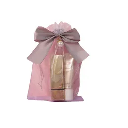 10 * 15cm 13 * 18cm 17 * 23cm 20 * 30cm Drawstring Organza Väskor Bowknot Pearl Bow Champagne Färg Transparent Wrapping Bag Presentpåsar Smycken Påse Candy