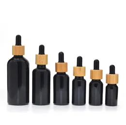 Flaconi contagocce in vetro nero naturale resistente ai raggi UV con coperchio in bambù 10ML 15ML 30ML 50ML 100ML Bottiglia di olio essenziale SN2808