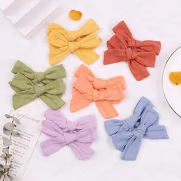 9,5 * 6,5 cm mode handgjorda bowknot spädbarn hårklippet solida färgbågar bangs hairpin barns barrettes baby headwear barn gåva