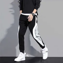 Byxor män solida elastiska midja streetwear joggare 2020 nya baggy drop-crotch byxor casual byxor man x0723