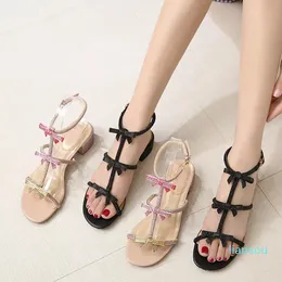 Lüks yüksek topuklu kadın sandaletler slayt moda yay tasarımcısı bayanlar lastik sandal düz roman ayakkabılar terlik parmak fıstığı ayakkabılar ayakkabı