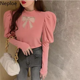 NEPLOE Koszulki dla kobiet Hollow Out Chic Bow Koszula Wiosna Ubrania Turtleneck Sweet Puff Sleeve Szybkie Koreańskie Teees Topy Mujer 94621 210422