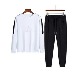 Men Woemn Tracksuit Top Version Spring Autumn Cotton Blend Tracksuits Tops+Pants Mens Mens Casual Jacket Sport Suit Asian Size