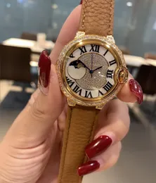 女性の幾何学的なムーンスター太陽の時計ステンレススチールクォーツ腕時計レディースラインストーンブレスレットコーヒーレザーベルト36mm