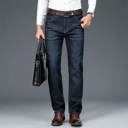 Jesienne dżinsy biznesowe Mężczyźni klasyczny styl ciemnoniebieski bawełniany dżinsowy dżins