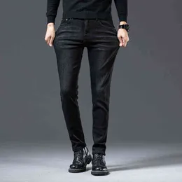 نهاية العلامة التجارية عالية الأزياء الخفيفة الفاخرة جينز الرجال النقي الأسود النحيف تناسب ليتل قدم الشباب الخريف والشتاء السراويل السميكة