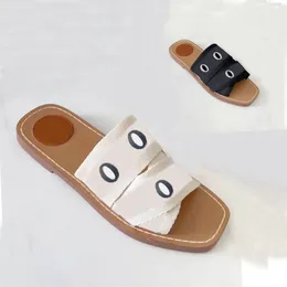 Designer Summer Beach tofflor mode Loafers Lazy Lågklackade floppar läder Bokstäver dam Cartoon Slides damskor Metall Damsandaler Stor storlek 35-4142 Med låda